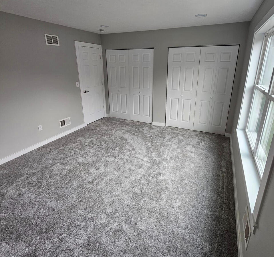 plush grey carpet installed in a room